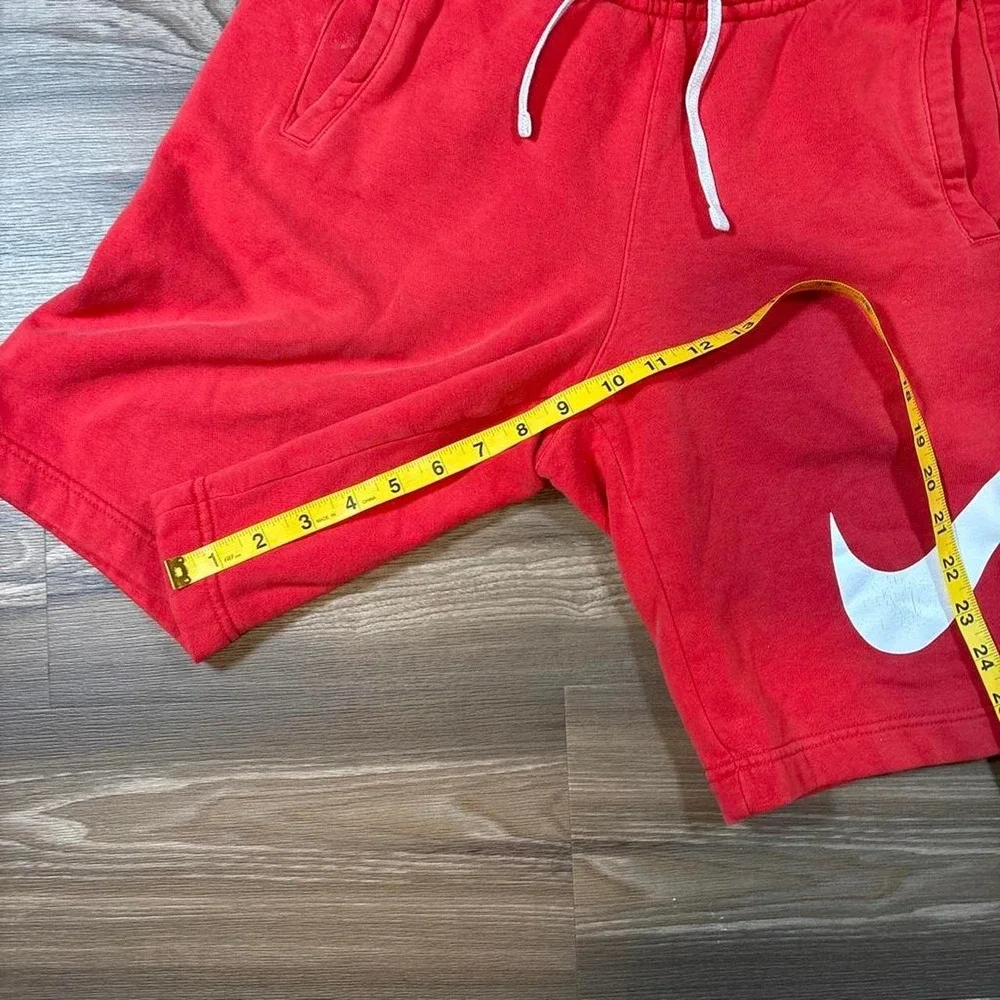 Nike red cotton & polyester shorts with white swoosh